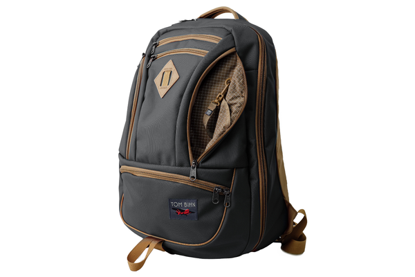 The Guide's Edition Synik 30 in Grey 630 Ballistic. Gray backpack with brown accents on a white background